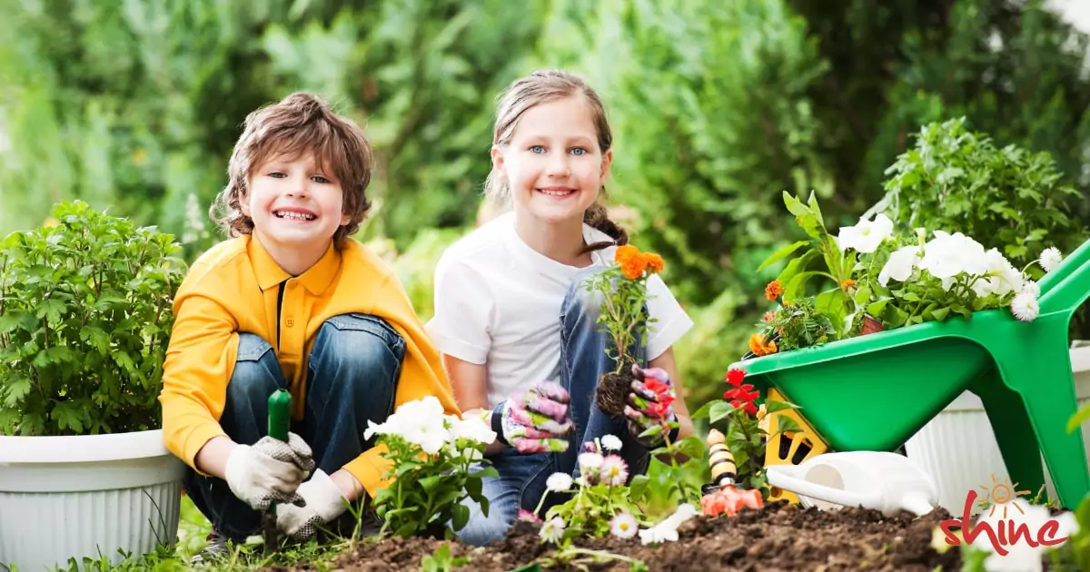 Children gardening and planting seeds