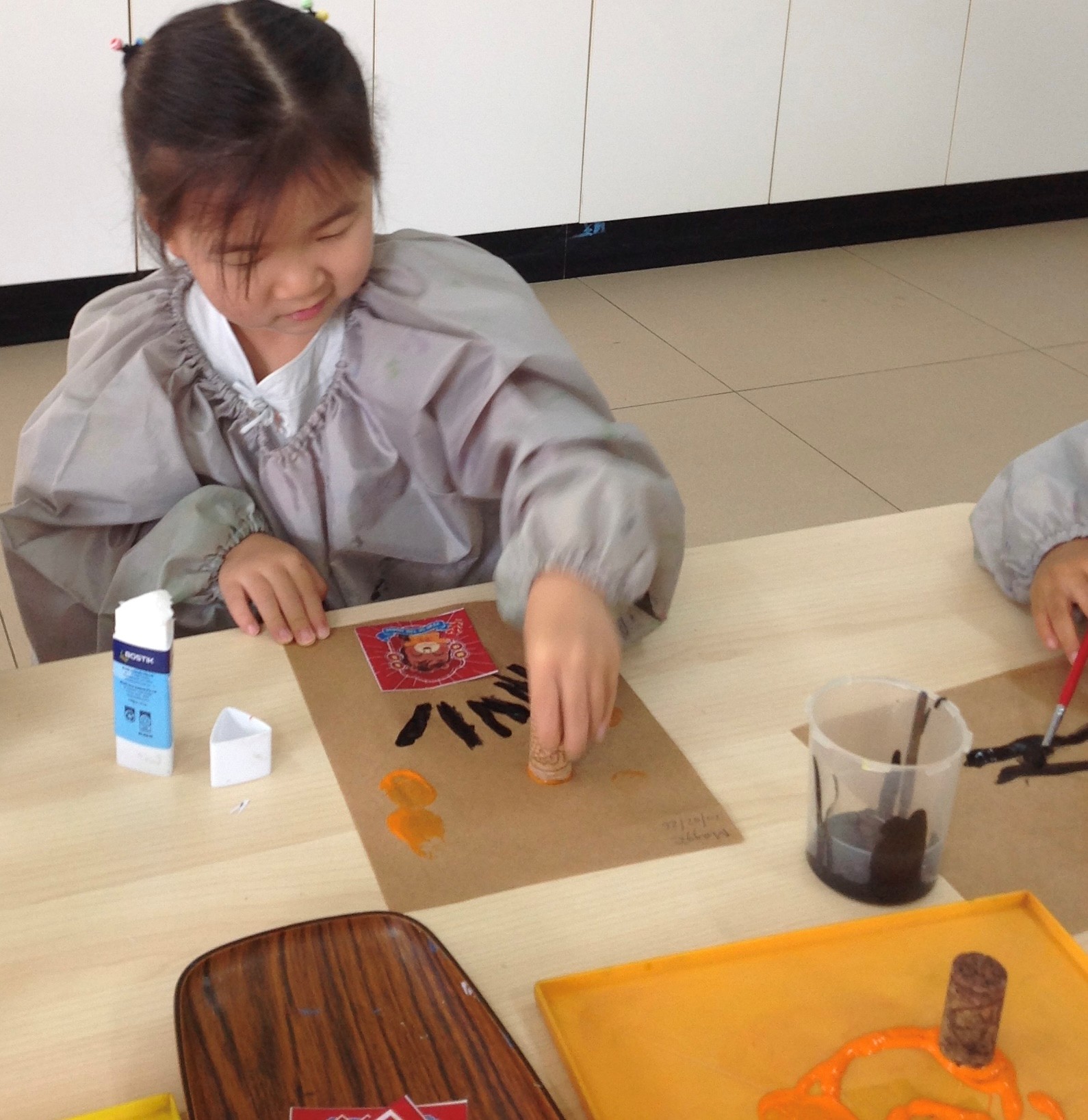 Children reading a book about sustainability